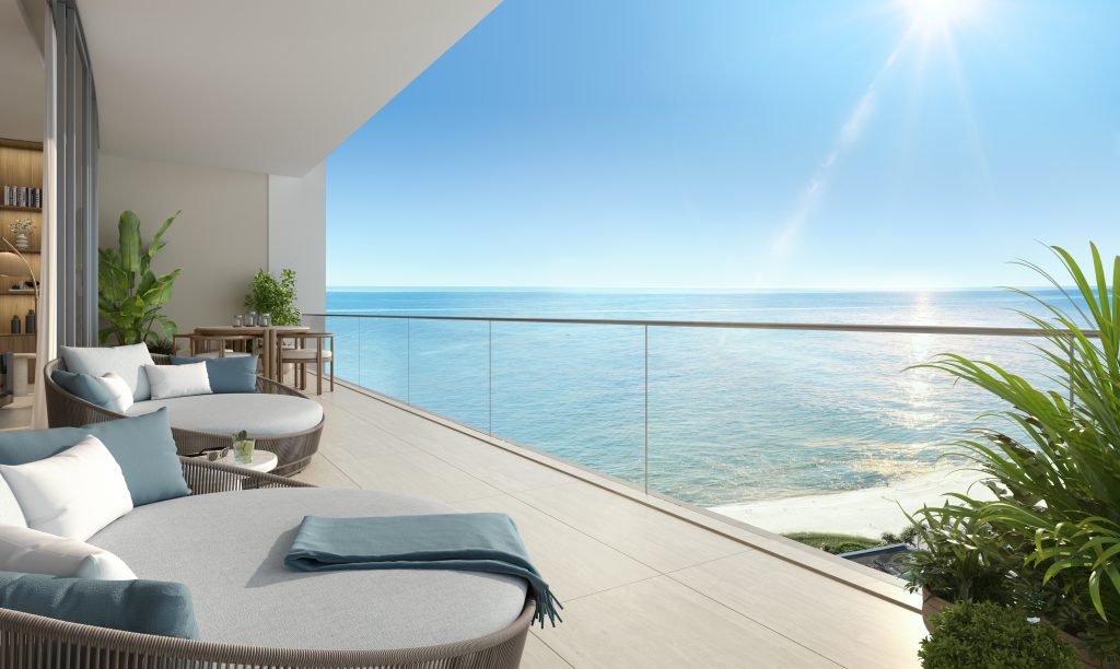 Private balcony with glass railing and direct Atlantic Ocean view at W Pompano Beach Residences