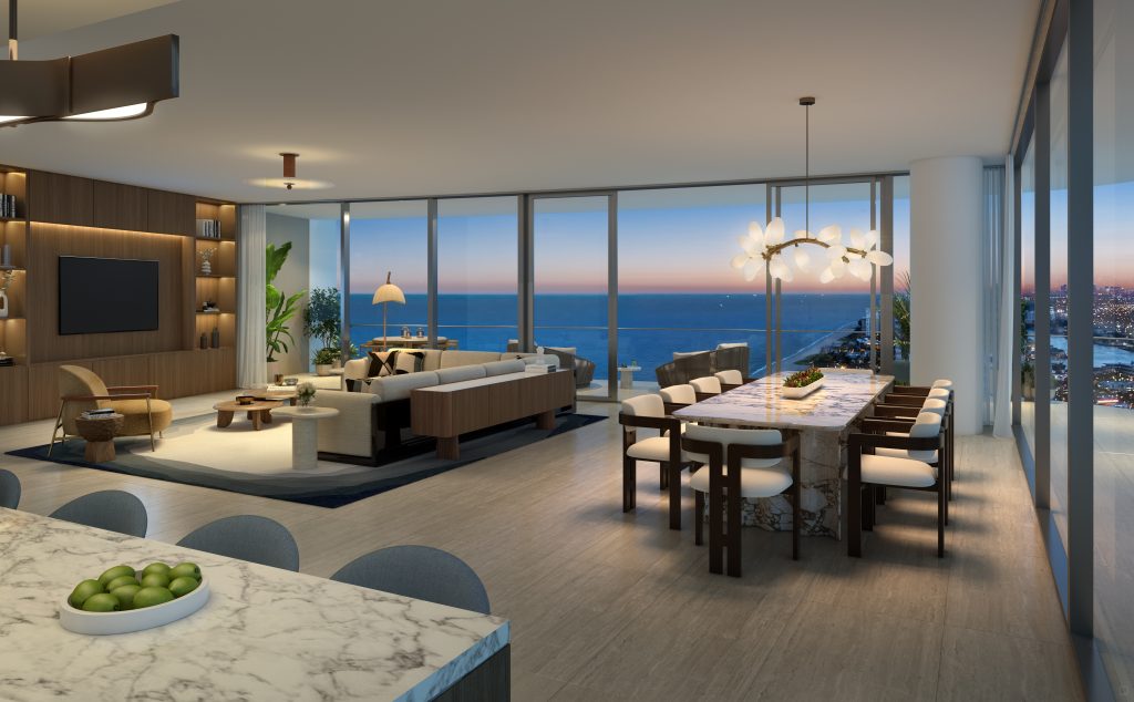 Open-plan living and dining room in a W Pompano Beach Residence with floor-to-ceiling ocean views at sunset
